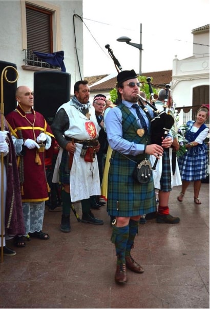 Playing bagpipes outdoors